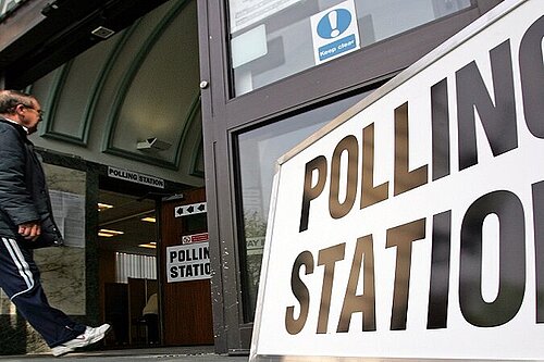 Building entrance with Polling Station sign.